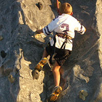 Kid on a climbing wall